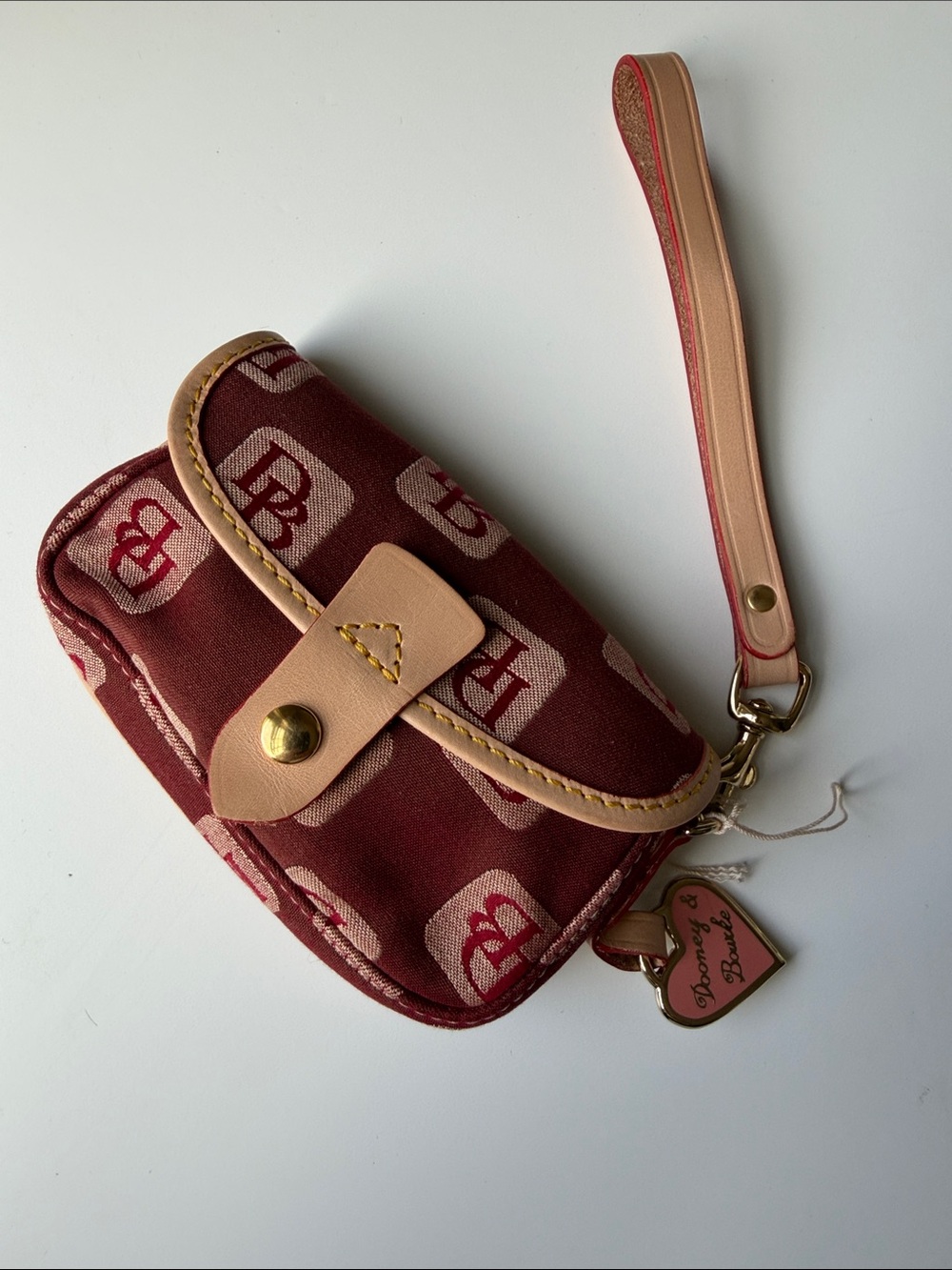 Dooney & Bourke Burgundy Signature Wristlet with Tan Trim